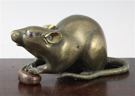 A Japanese gilt patinated bronze model of a rat with a nut, late 19th century, length 18cm